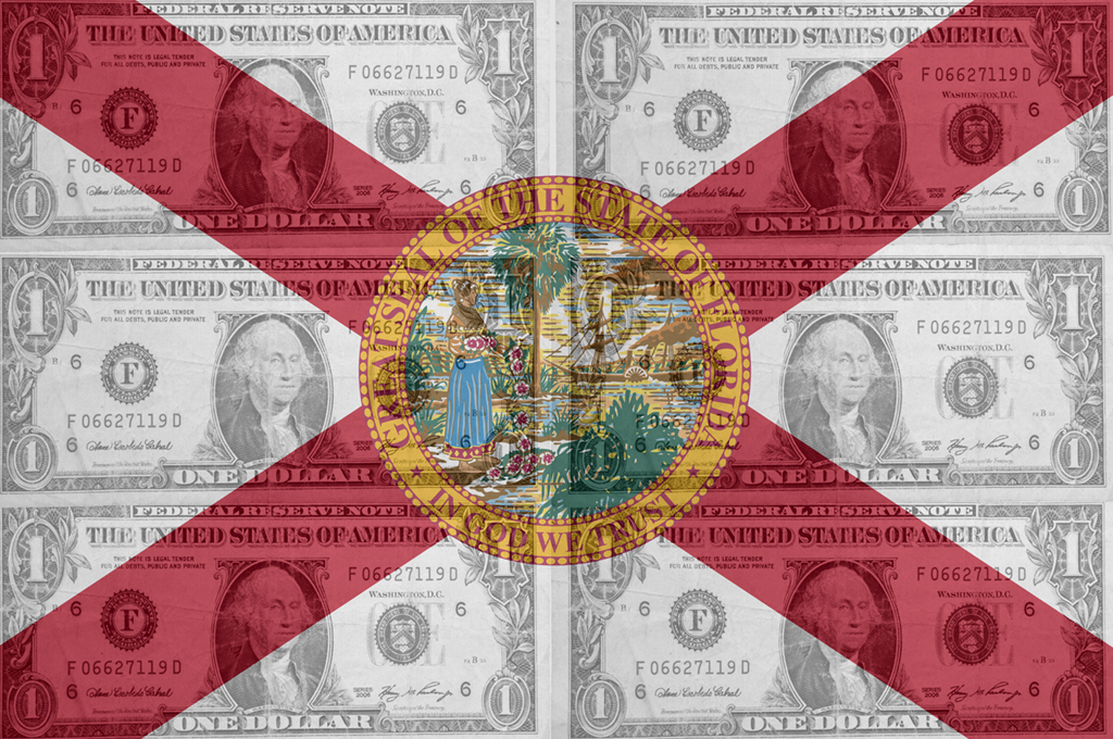 Image of the Florida State Flag with Dollar Bills in the Background